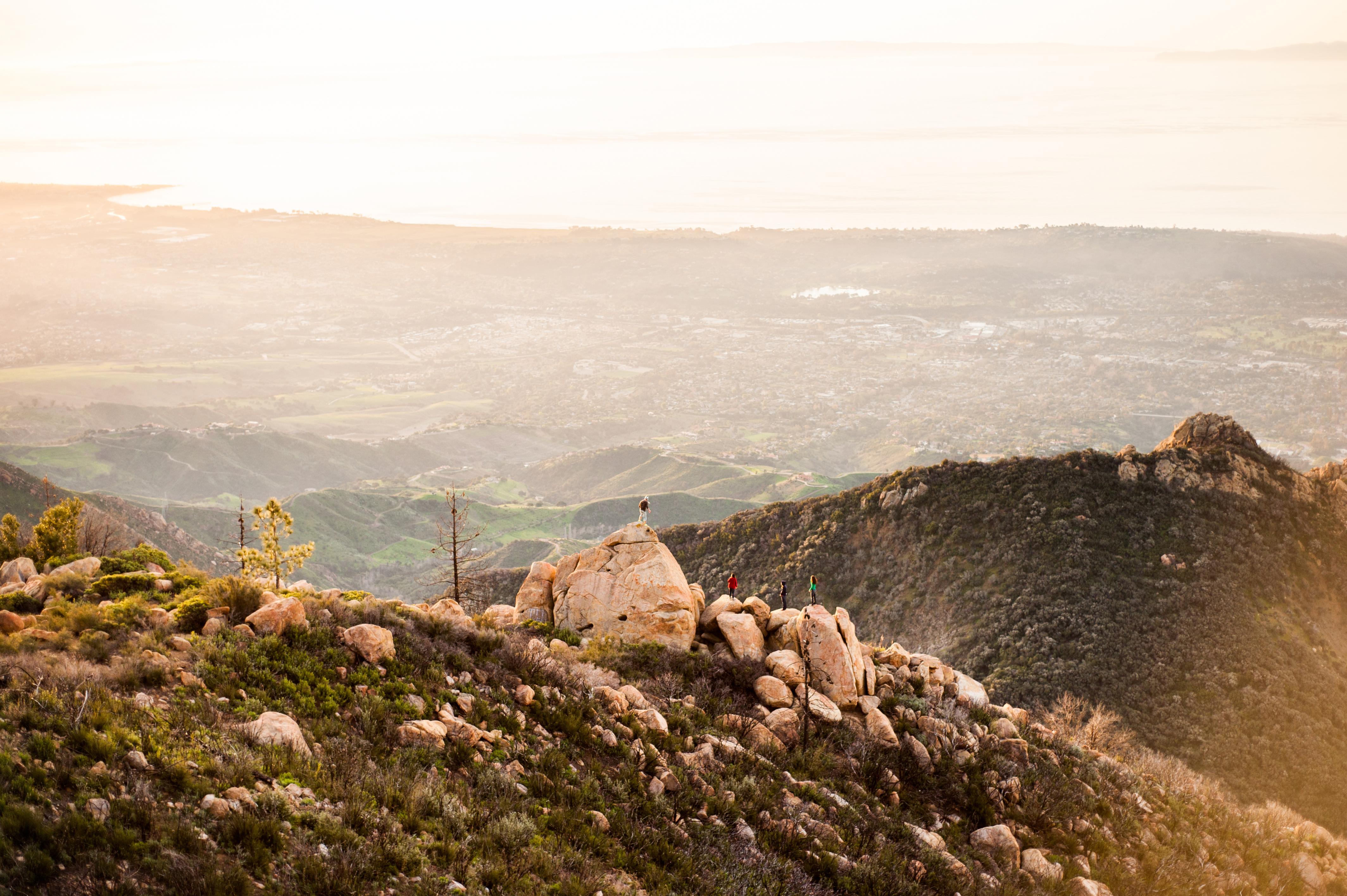 Students hiking on top of rocks in Santa Barbara mountains