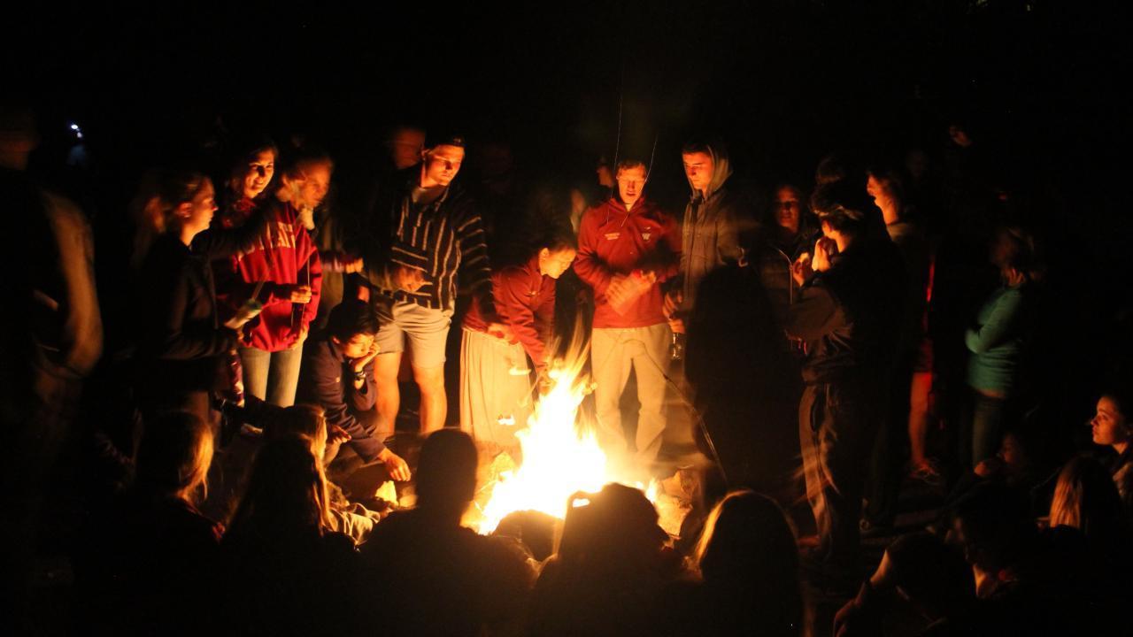 Students at a campfire